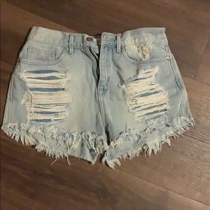 Distressed denim shorts